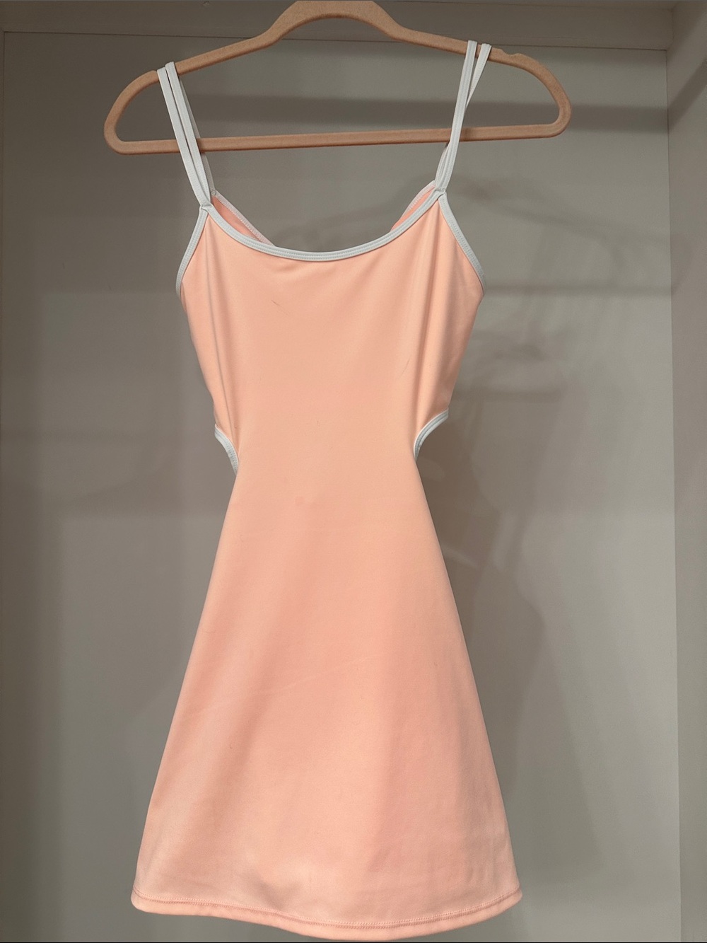 Free People Movement small Womenโs Peach active Dress with White Trim. Like new